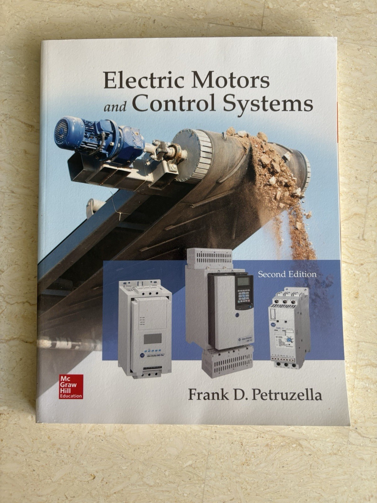 Electric Motors and Control Systems – Paperback, by Petruzella Frank – Good